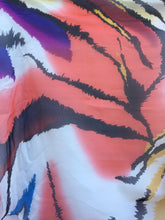 SLX-06/05 Tiger stripe print with splashes of blue, purple, and yellow.