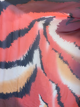 SLX-06.28 Tiger stripe print with splashes of bright orange, brown, and yellow.