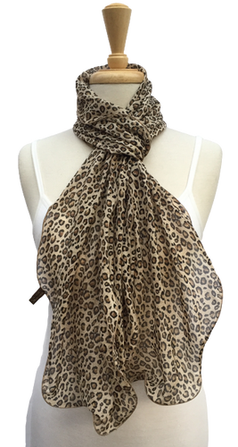 SL07-28 Brown and yellow animal print scarf with curled edges.