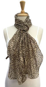SL07-28 Brown and yellow animal print scarf with curled edges.