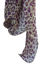 SL03-29 Purple and yellow animal print scarf with curled edges.